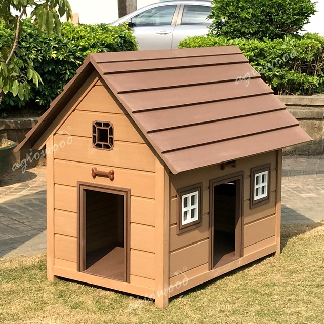 Dakkel nga aso iti ruar kennel (a) .